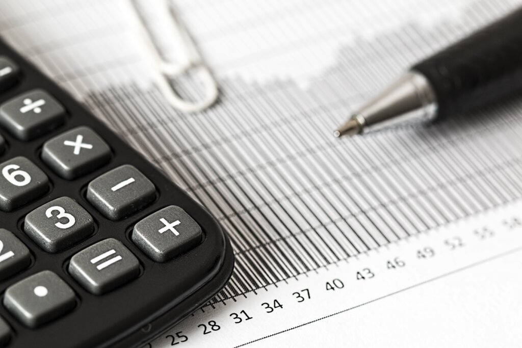 Closeup of financial documents and a calculator